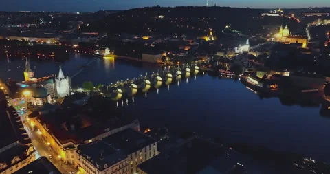Aerial view of Prague at night. The most beautiful view of the Charles Bridge at Stock Footage 323200116