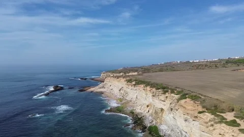Aerial view of Praia de Ribeira D´Ilhas Ericeira Stock Footage 319843953