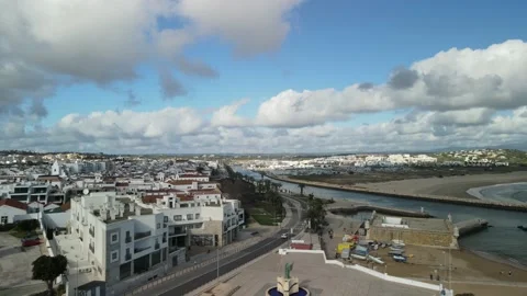 Aerial view of Praia dos Estudantes and marina in Lagos Stock Footage 167794341