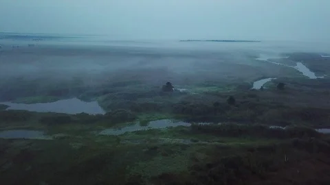 Aerial view of pre-dawn mist over lakes 스톡 동영상 111437923