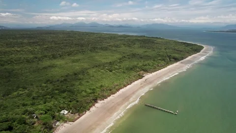 Aerial View of Pristine Beach and Lush Green Forest in a Tropical Island Stockbeeldmateriaal 336455202