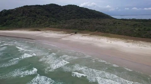 Aerial View of a Pristine Brazil Beach with Lush Green Coastal Forest Stockbeeldmateriaal 336452525