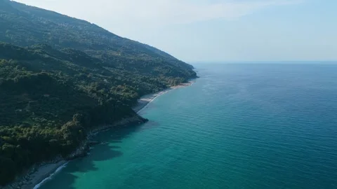 Aerial view of the pristine coastline of Analipsi and Tourkopigi Beach on the Stock Footage 346719702