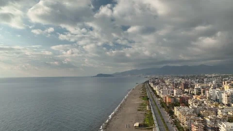 Aerial View: A pristine coastline with azure waters and lush surroundings Stock Footage 296029111