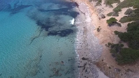 Aerial view of a pristine isolated beach. Stock Footage 128799989