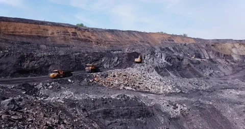 Aerial view of process of mining coal in a quarry. Video stock 169062159