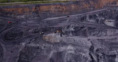 Aerial view of process of mining coal in a quarry. Video stock 169062197