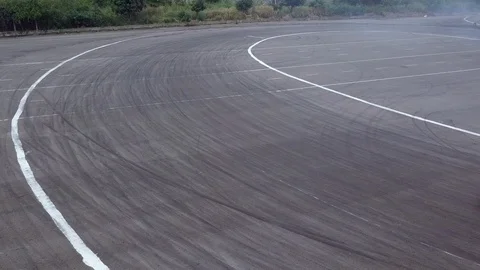 Aerial view professional driver drifting car on asphalt race track. Stock Footage 93971747