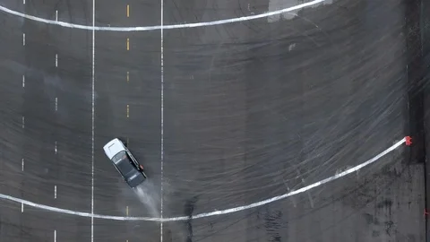 Aerial view professional driver drifting car on asphalt race track. Video stock 93971994