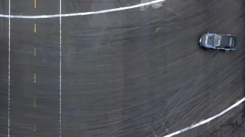 Aerial view professional driver drifting car on asphalt race track. Video stock 93972156