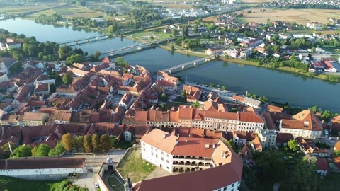 Aerial View of Ptuj Castle, Old Town and Drava River, Slovenia Vídeos de archivo 344923176