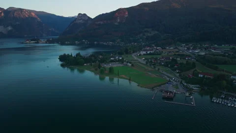 Aerial view of public beach park and sailboat marina on Lake Traunsee shore Видео 344183337