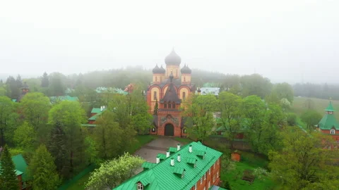 Aerial view of Pühtitsa Convent in Ida-Virumaa, Estonia on a foggy day Stock Footage 154626584
