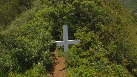 Aerial View Pull Out On Holy White Cross To Reveal Kapilau Ridgeline, Maui Stock Footage 74113060