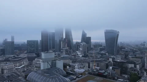Aerial view pull out shot Central London during  a foggy day Stock Footage 234407783