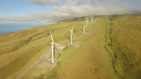 Aerial View Pull Out Wind Turbines, Windmills on Grassy Hillside. Stock Footage 72664277