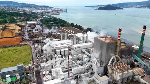 Aerial view of a pulp and paper mill releasing steam Stock Footage 335265783