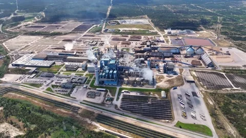 Aerial view of a pulp mill and biomass power plant producing cellulose Stock Footage 340312012