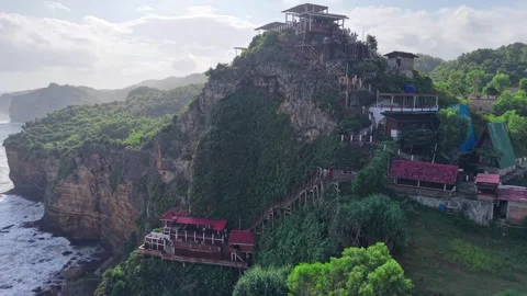 Aerial View of Puncak Segoro Cliffside Café in Yogyakarta - June 27, 2025 Video stock 312159063