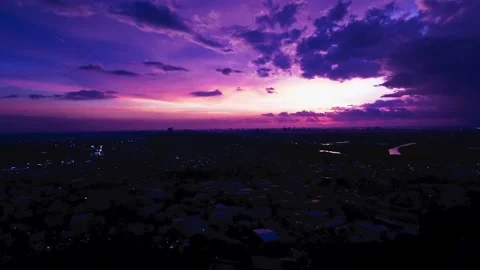 Aerial View of Purple Sky During Blue Hour Over City Stock Footage 345551139