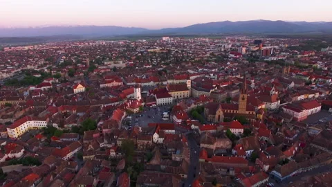 Aerial view of a purple sunset in Sibiu Romania Stock Footage 151272753