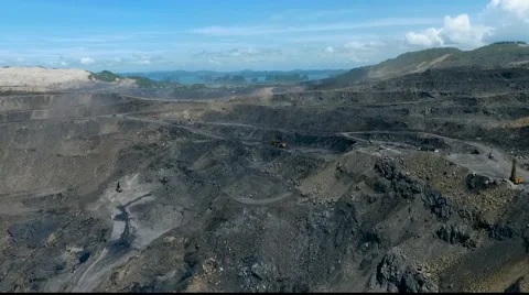 Aerial view of the quarry and dump trucks Stock Footage 67666960