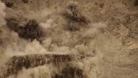 Aerial view of a Quarry Explosion directly above Stock Footage 236709615
