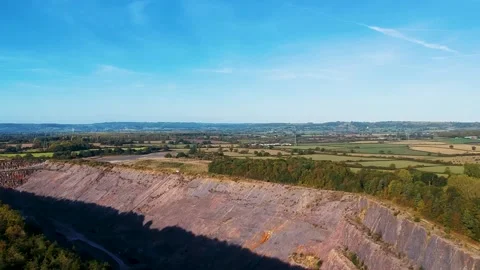 Aerial view of a quarry in the South-West English countryside Stock Footage
