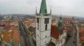 Aerial view of quiet street, cosy lane in old city downtown, few cars, no people 4k or 4k+ Resolution