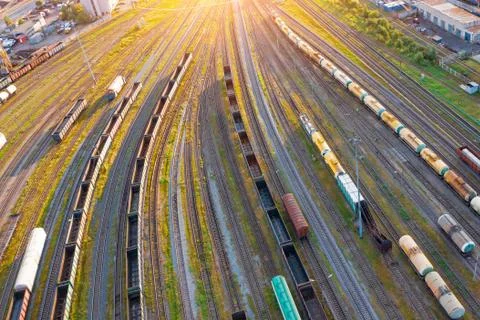 Aerial view of rail sorting freight station with various wagons, with many ra Foto stock