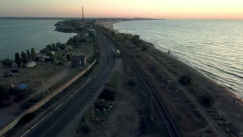 Aerial view of railway between two sea Stock Footage 134423469