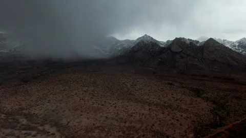 Aerial View of Rain Clouds and Snow in Arizona Mountains 4K Stock Footage 154207676