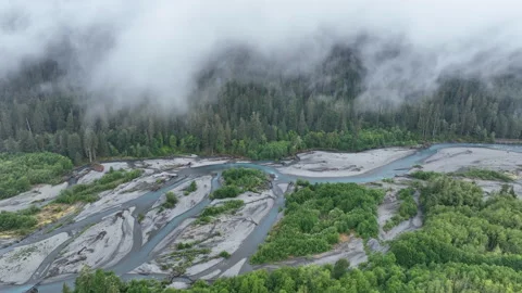 Aerial View of Rain Clouds Drifting Above the Hoh River on the Olympic Peninsula Stock Footage 247230704