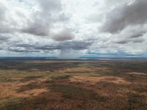 Aerial view of a rain patch into a vast plain landscape 2 Stock-Fotos