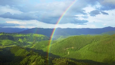 Aerial view of rainbow in the mountains Stock Footage 116991909