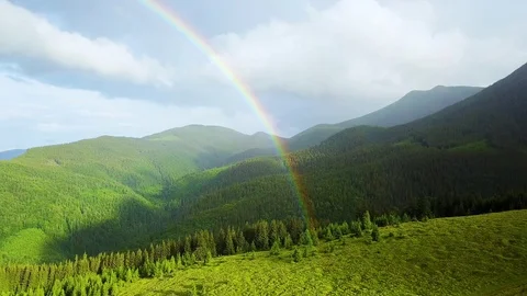 Aerial view of rainbow in the mountains Stock Footage 116991919