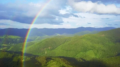 Aerial view of rainbow in the mountains Stock Footage 117921789