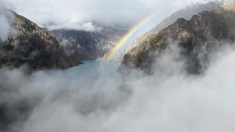 Aerial view of a rainbow over Shey Phoksundo Lake in Nepal 库存影片 323036015