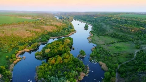 Aerial view of rapid river on sunset Stock Footage 76299549