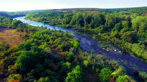Aerial view of rapid river valley Stock Footage 60744694