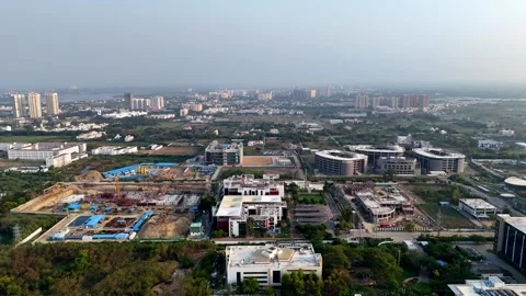 Aerial view of a rapidly developing urban and corporate landscape. In the Stock Footage 310335569