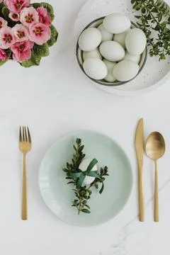 Aerial view of raw eggs on a white marble table Stock Photos