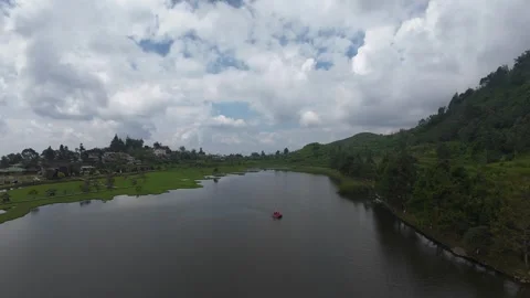 Aerial view of Rawa Gede Jonggol Lake and green hills, Indonesia. Stock Footage 336380795