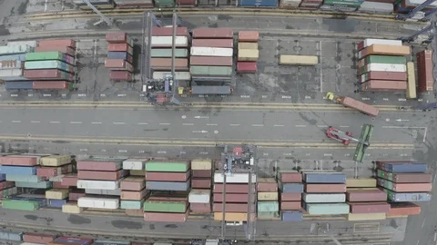 Aerial view of Reach Stackers move containers, freight terminal, Spezia seaport. Stock Footage 122099154