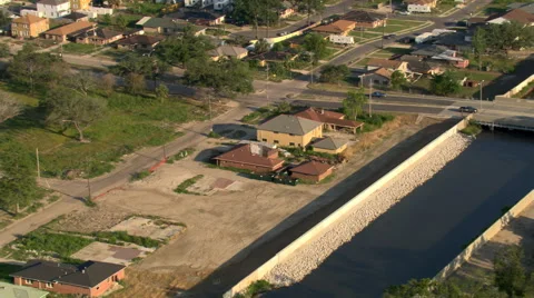Aerial view of rebuilt levee, 9th Ward, New Orleans, Louisana Stock Footage 59540058
