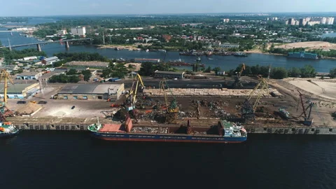 Aerial view on Recycling, loading scrap metal in the ship. Russia. Port of Stock Footage 99963797