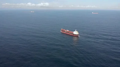 Aerial view of a red and black oil tanker sailing on the high seas. Stock Footage 138696501