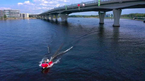 Aerial view of a red boat sailing along the sea Stock-Footage 132876752