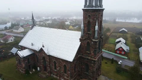 Aerial View of Red Brick Catholic Church with Gothic Spires in Belarus Stock Footage 316167822