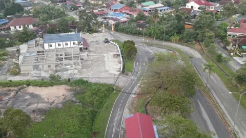 Aerial view of red Car moving on the road to Kampung Limau Manis Video stock 150747424